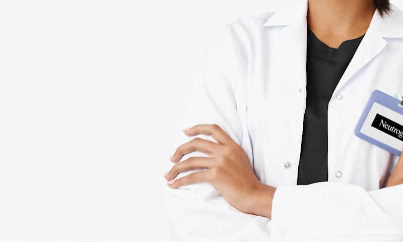 Dermatologist with a lab coat wearing a Neutrogena® tag