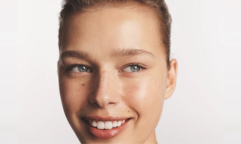 Woman smiling after using Neutrogena® Hydro Boost products
