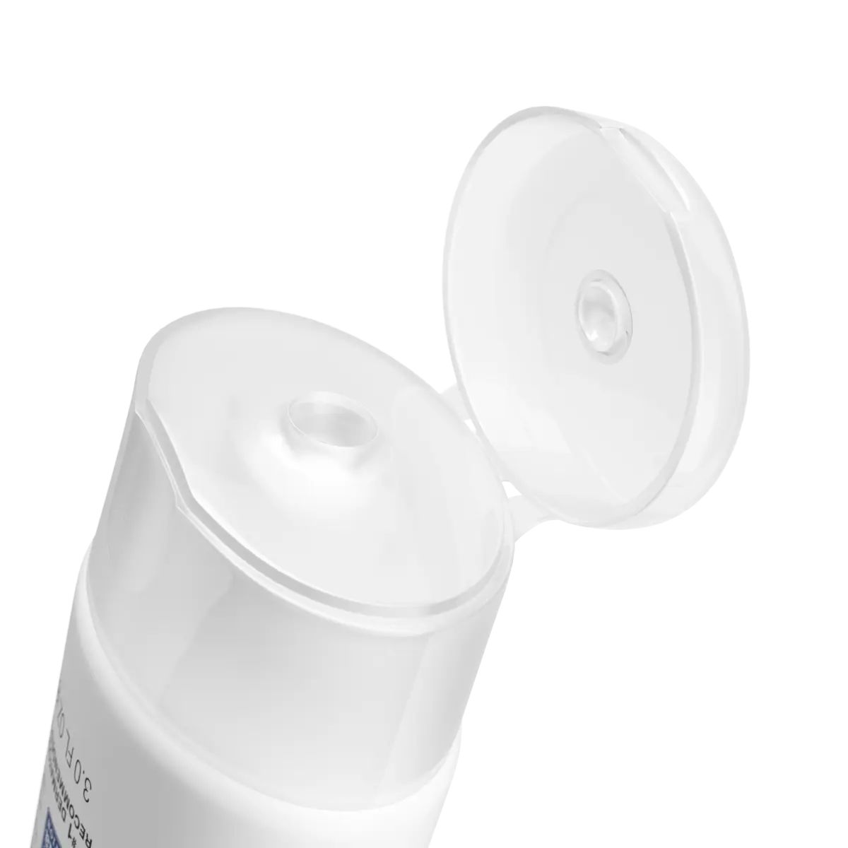 Pure & Free baby sunscreen bottle with flip-top cap open, dispensing hole visible