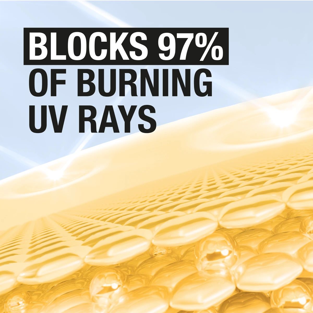 Graphic stating blocks 97 percent of burning UV rays over golden cells background