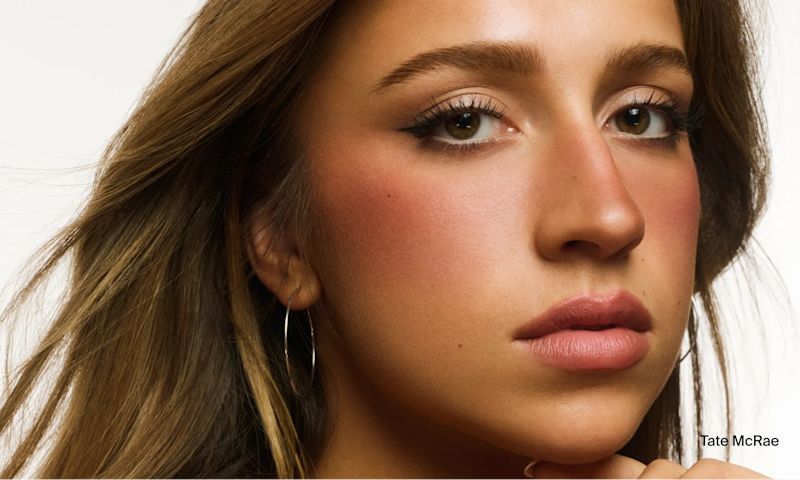 Tate McRae with healthy skin after using Neutrogena® products made with hyaluronic acid for improved skincare