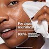 Woman wiping face with Makeup Remover Ultra-Soft Cleansing Towelettes For clean nourished skin.