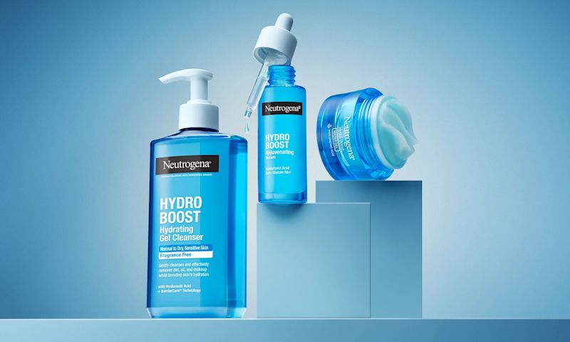 Neutrogena® Hydro Boost Hydrating Gel Cleanser Fragrance Free, Rejuvenating Serum and Water Gel outside their packaging together on top of a block pedastal