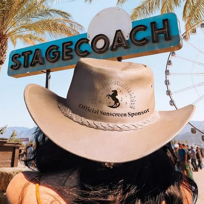 Woman wearing a hat at the Stagecoach Festival