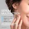 Femme qui se touche le visage, texte disant «Sérum multi-action» et «Donne un teint plus net, resserre les pores, unifie le teint, hydrate la peau»