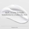 Text that reads: "Rich, creamy formula transforms to a water-like feel" over a smooth thick swatch of cream.