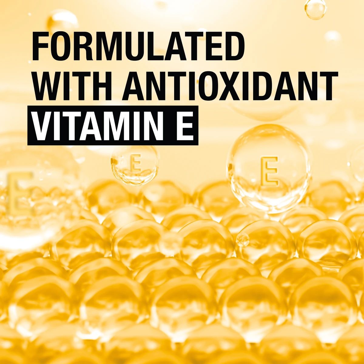 Golden Vitamin E spheres highlighting antioxidant Vitamin E formula
