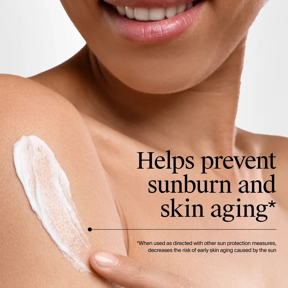 Smiling model applying sunscreen to her shoulder with a caption about preventing sunburn and skin aging