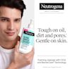 Person holding new Neutrogena® Ultra Gentle Foaming Cleanser with CICA and BarrierCare® Technology.