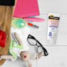 Baby travel bag essentials with Pure & Free baby sunscreen SPF 50 tube on tile floor