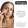Woman applying Neutrogena® foamy cleanser with Hyaluronic Acid and BarrierCare® technology