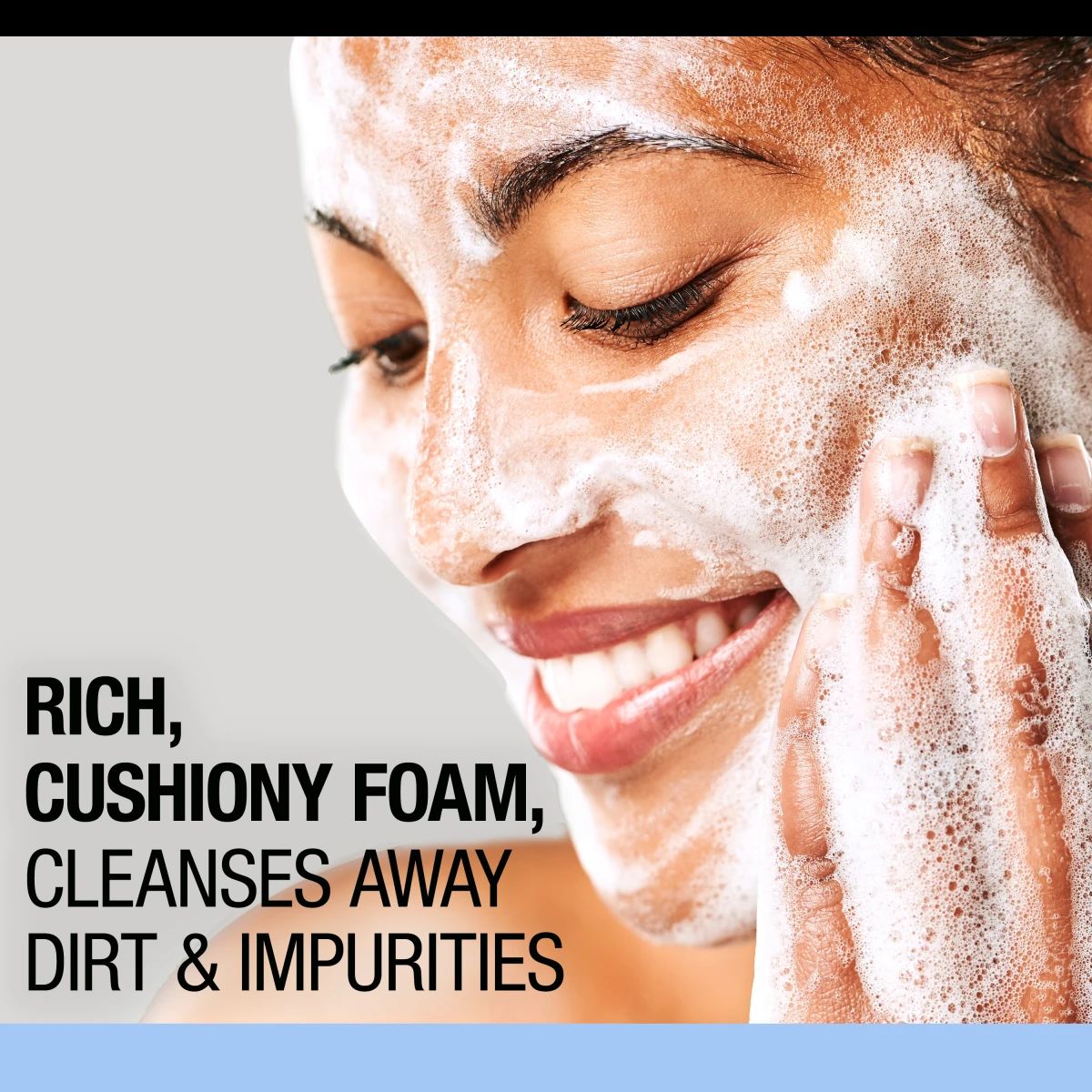 Woman applying Neutrogena® rich cushiony foam cleanser that removes dirt and impurities