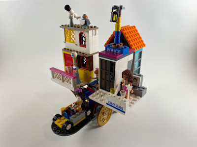 Photograph of LEGO creation "Restaurant House Police Boat Car"