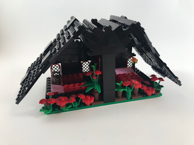 Photograph of LEGO creation "Gothic Garden A-Frame Chalet"
