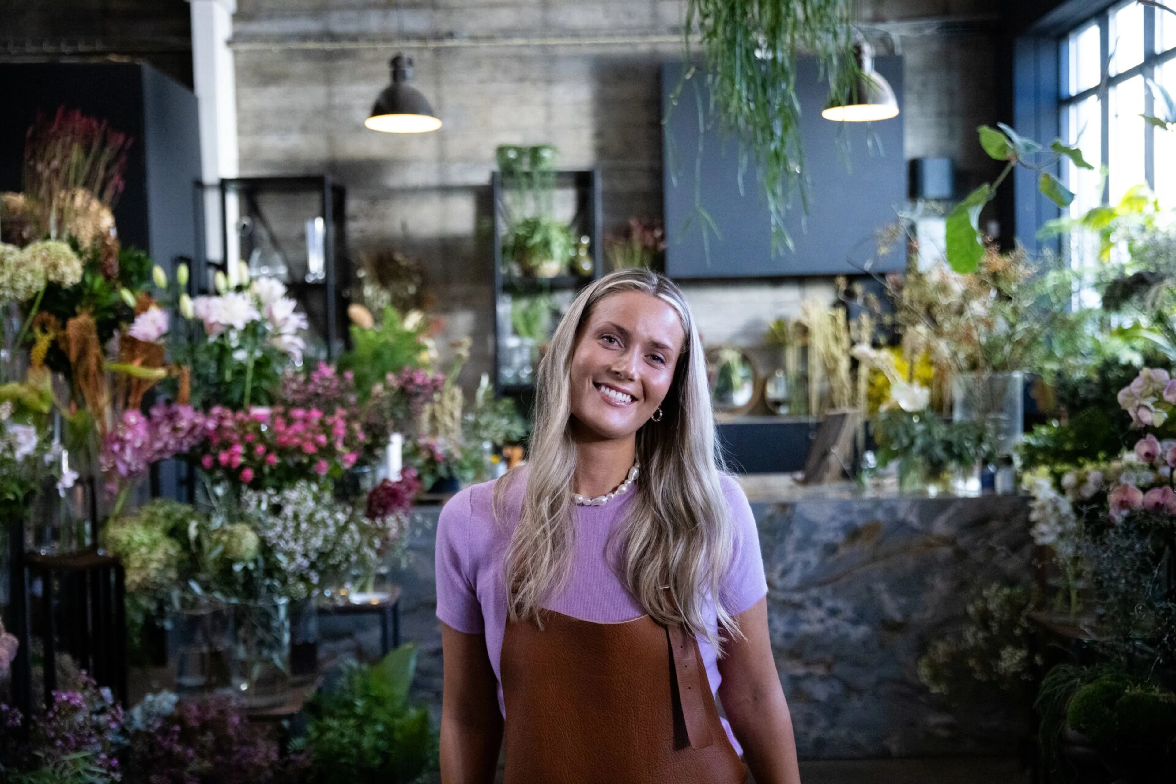 Starfsmaður í blómabúð