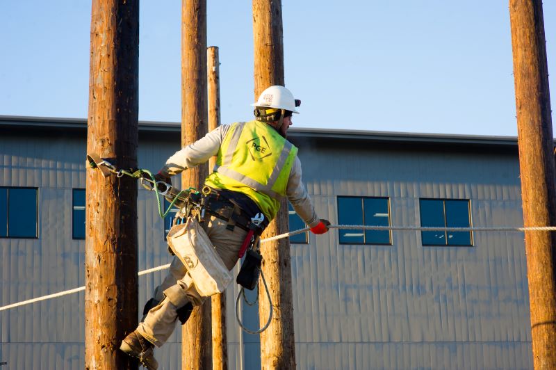 A PGE pre-apprentice gains confidence with their gear during a line crew training event