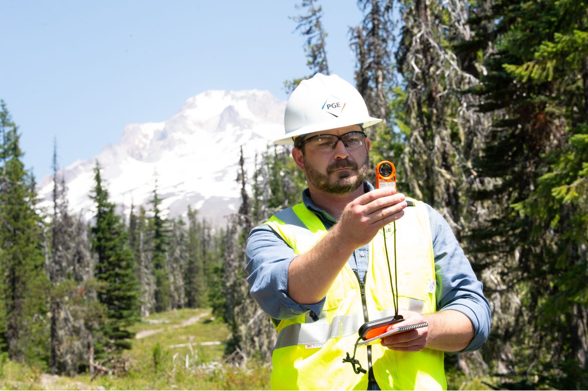 senior technical program manager for PGE’s wildfire operations program management, field-validates weather conditions with a handheld fire weather meter