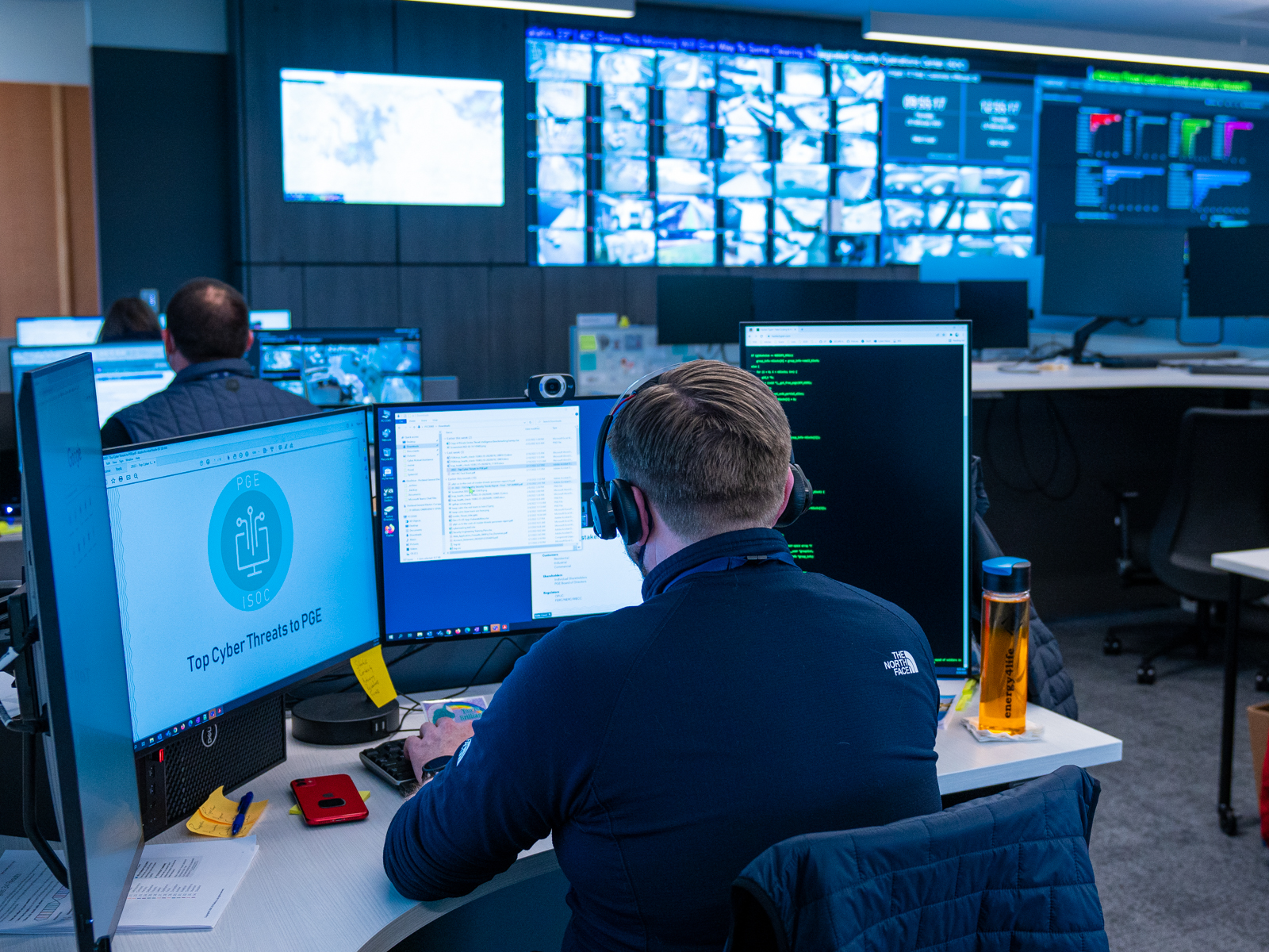 A person at a desk in the Integrated operations center IOC