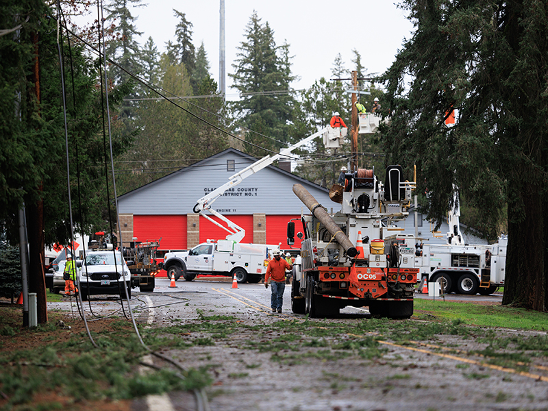 PGE line crews work to restore power near Oregon City, Ore., following an overnight wind event on Dec. 17, 2025 that left thousands of customers without power.