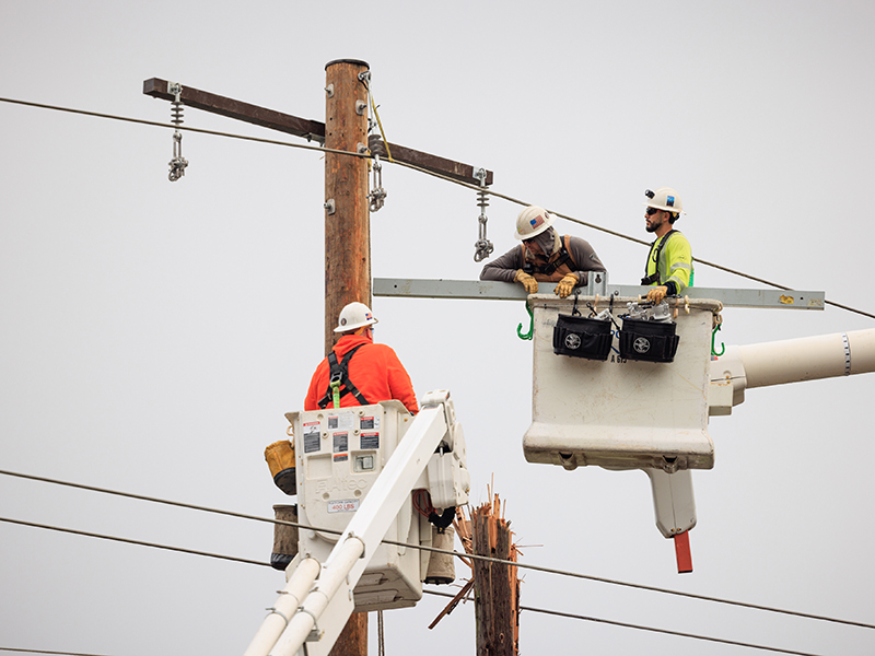 PGE line crews work to restore power near Oregon City, Ore., following an overnight wind event on Dec. 17, 2025 that left thousands of customers without power.