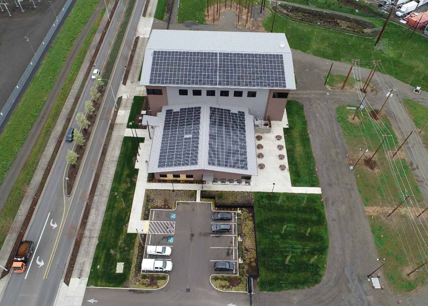 Sherwood Training Center: This facility, where linemen-in-training learn the skills of the trade, was designed and built with a roof surface large enough to generate enough solar energy to meet the power needs of the entire facility.  82kW of solar capacity were installed in 2021, with another 81kW added in December 2023.  The training center is currently a Zero Emissions facility - a building that is highly energy efficient, does not emit greenhouse gases directly from energy use, and is powered solely by clean energy - with surplus production and room for future growth included in the build.