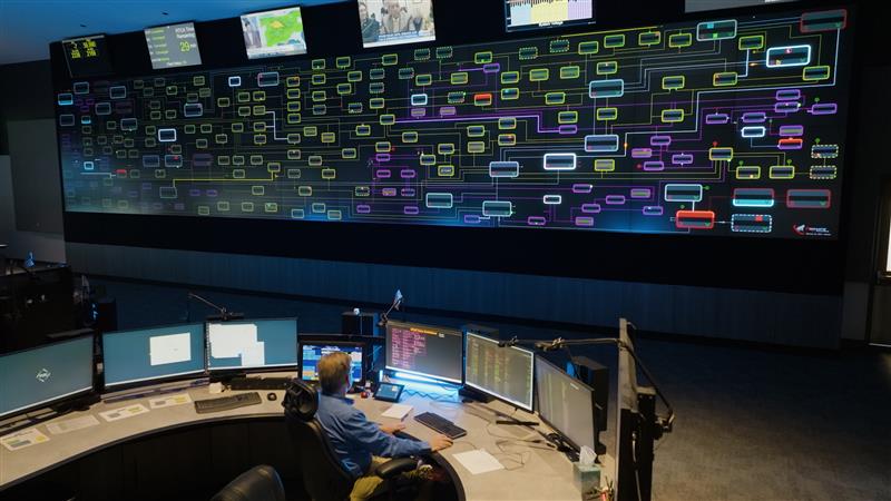 A person working at their desk in the Integrated operations center IOC