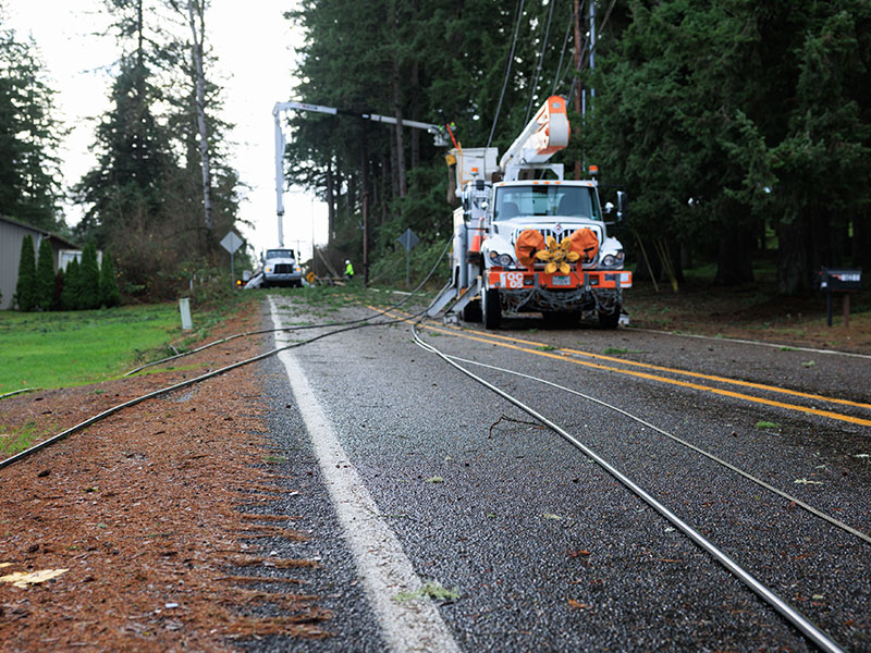 PGE line crews work to restore power near Oregon City, Ore., following an overnight wind event on Dec. 17, 2025 that left thousands of customers without power.