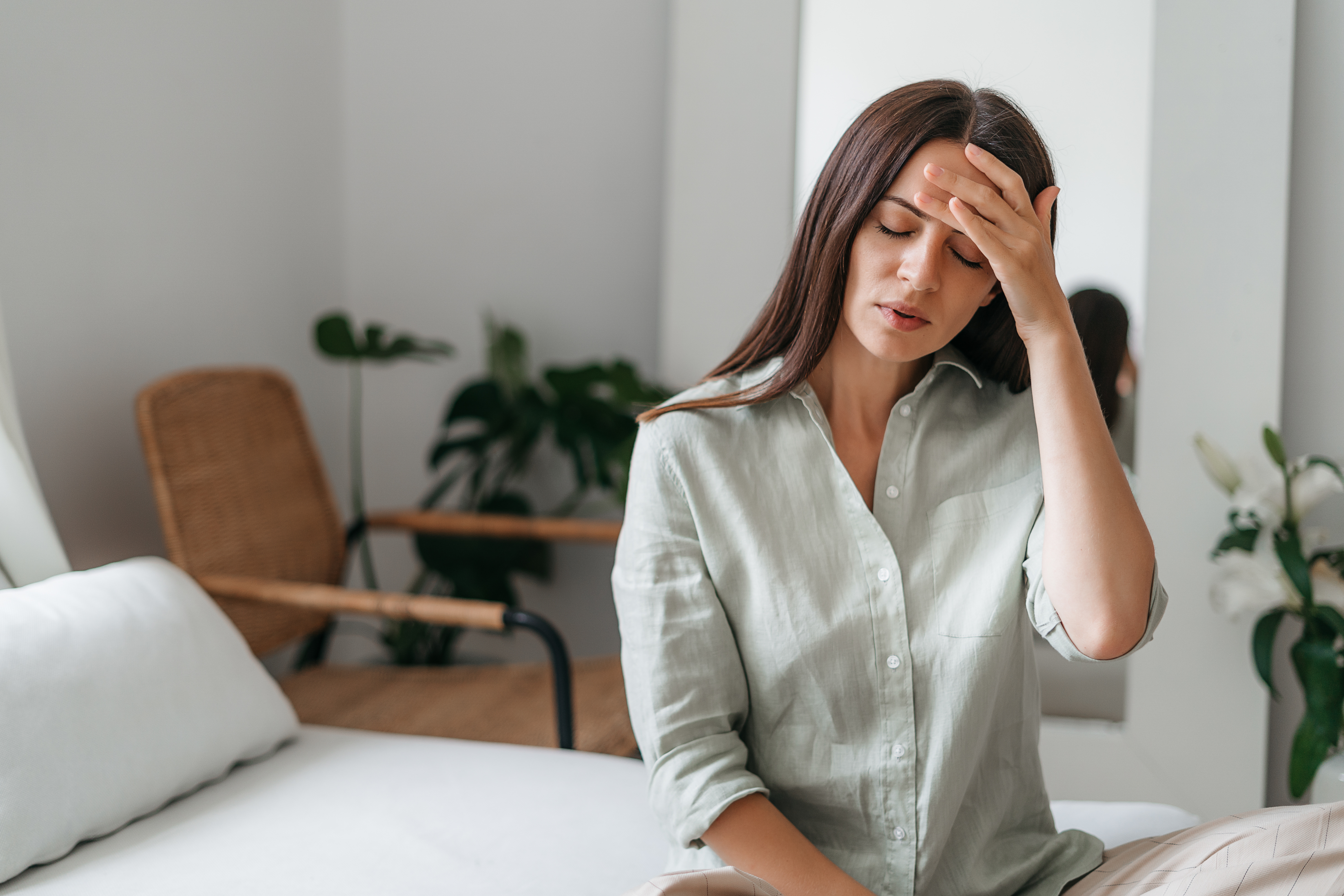 Mujer con dolor de cabeza