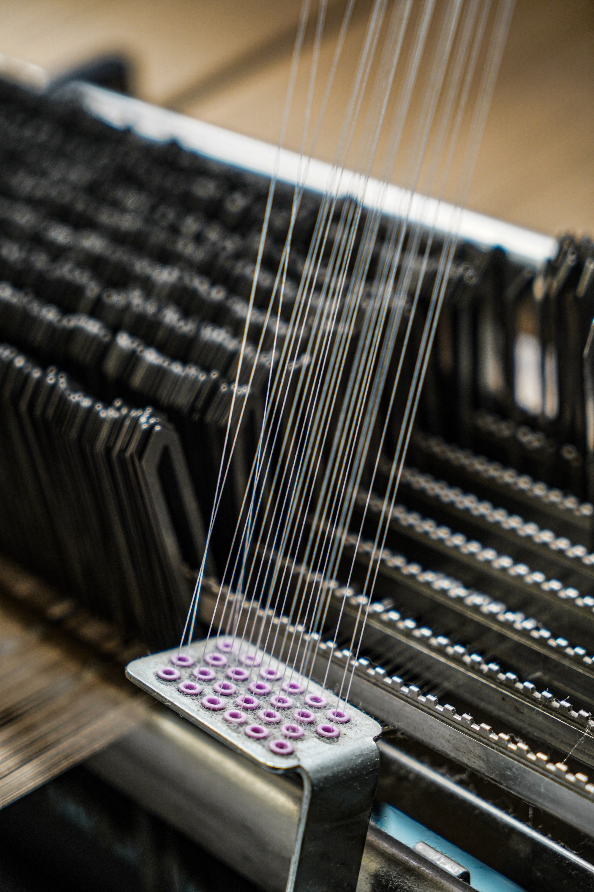 threads on weaving machinery