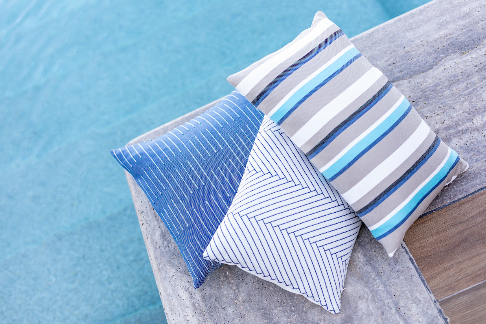 blue cushions on lounge chairs