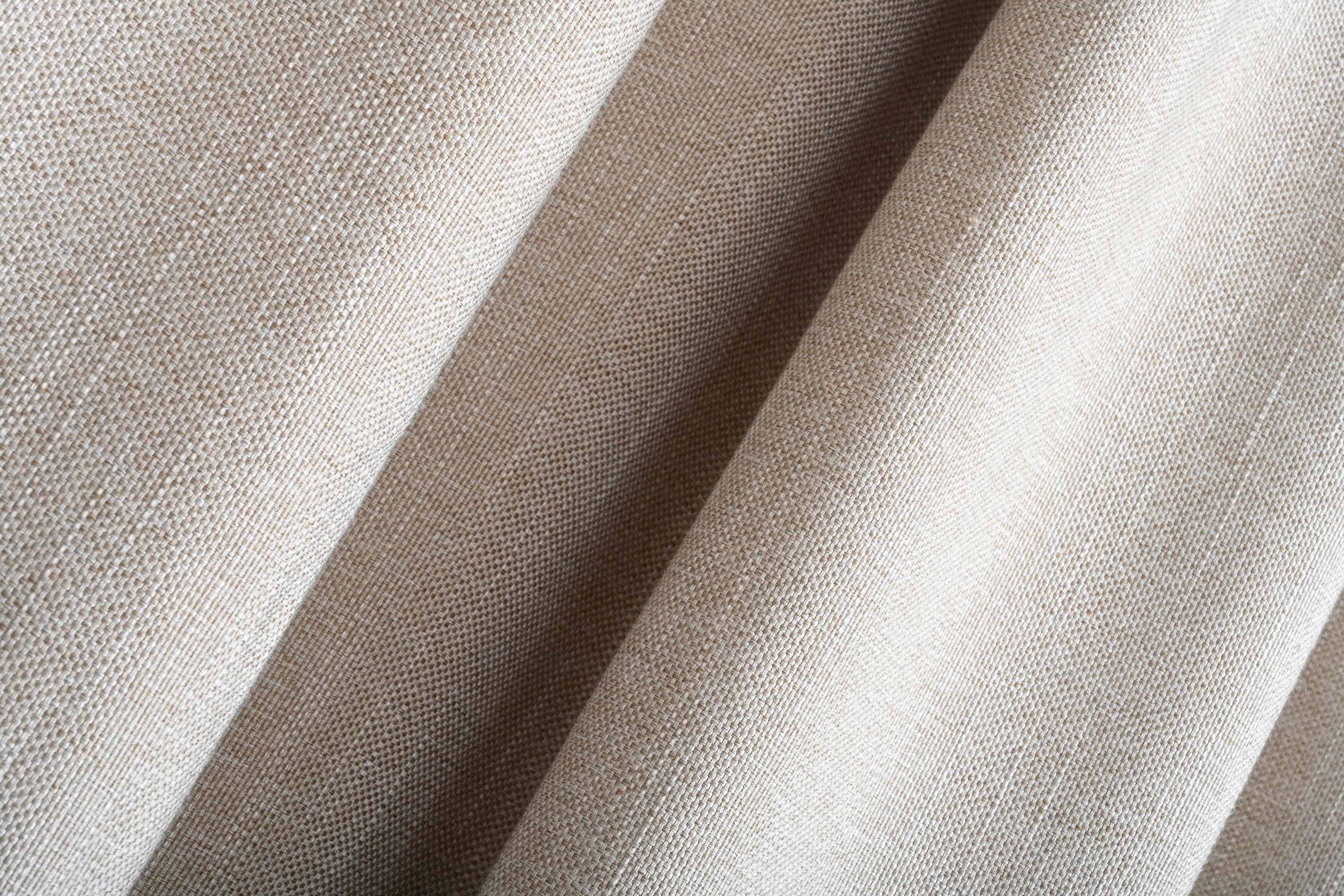 close up of cream colored fabric 