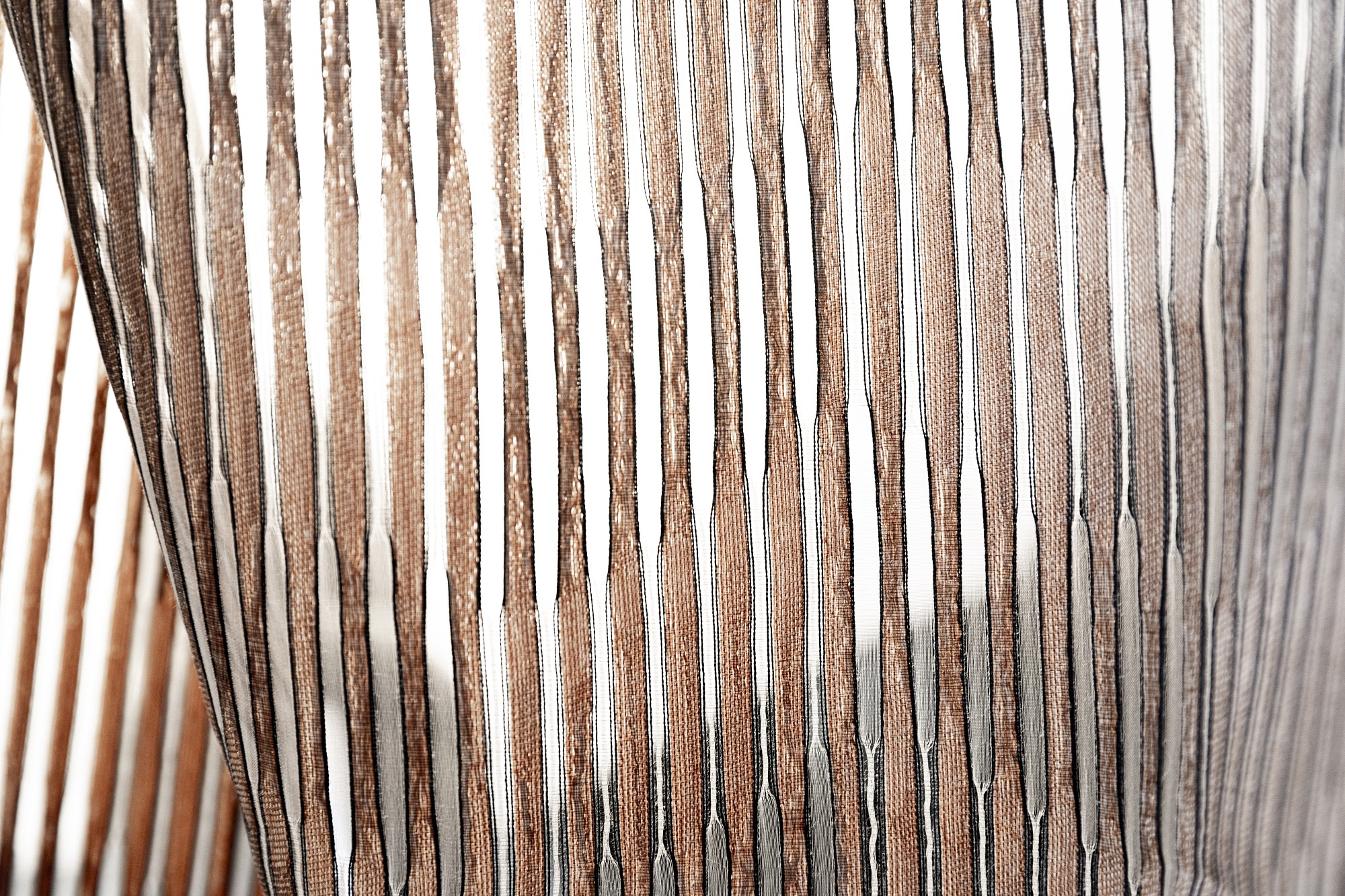 close up of patterned sheer trevira fabric