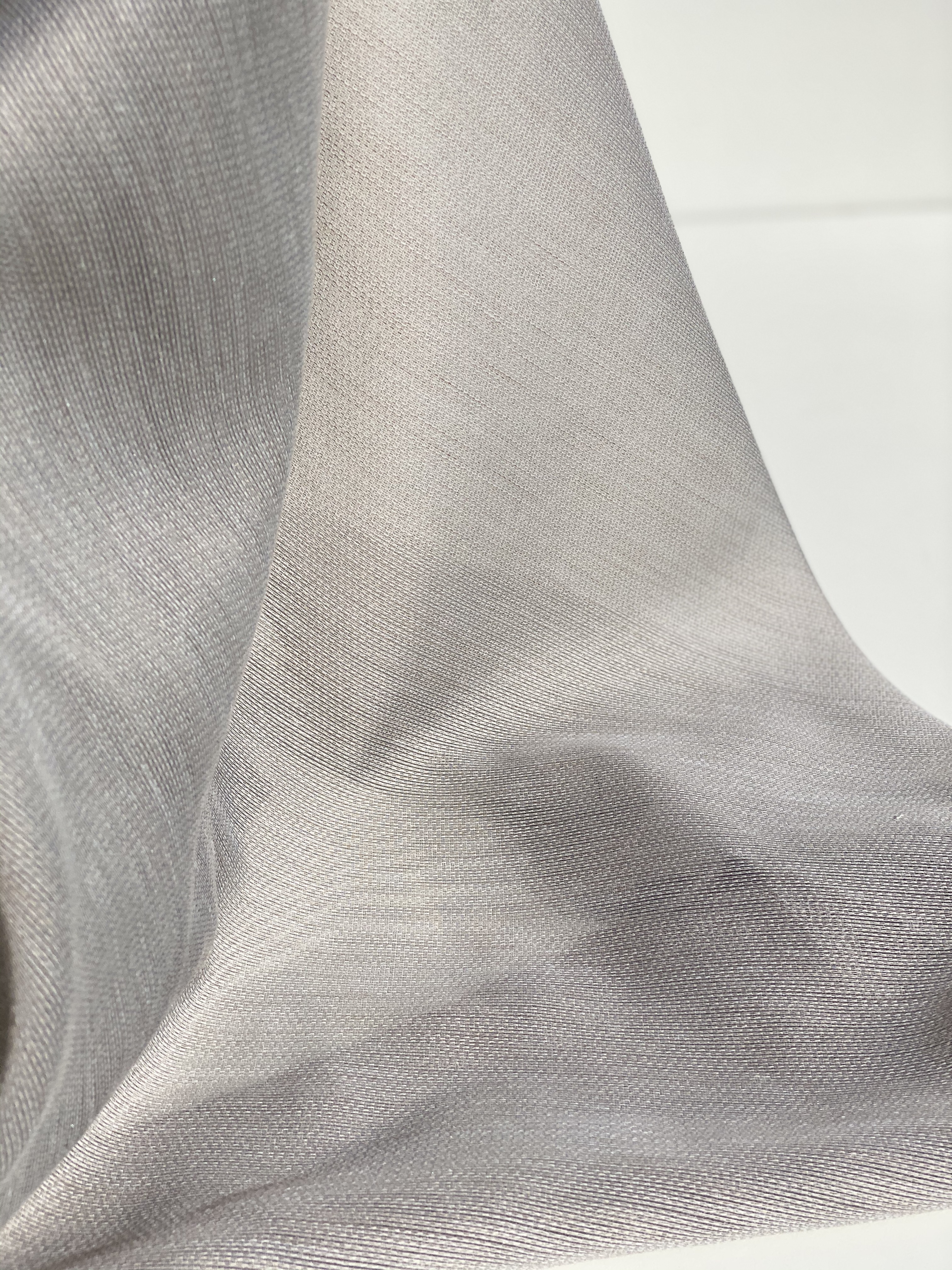 Blue semi-sheer drapery