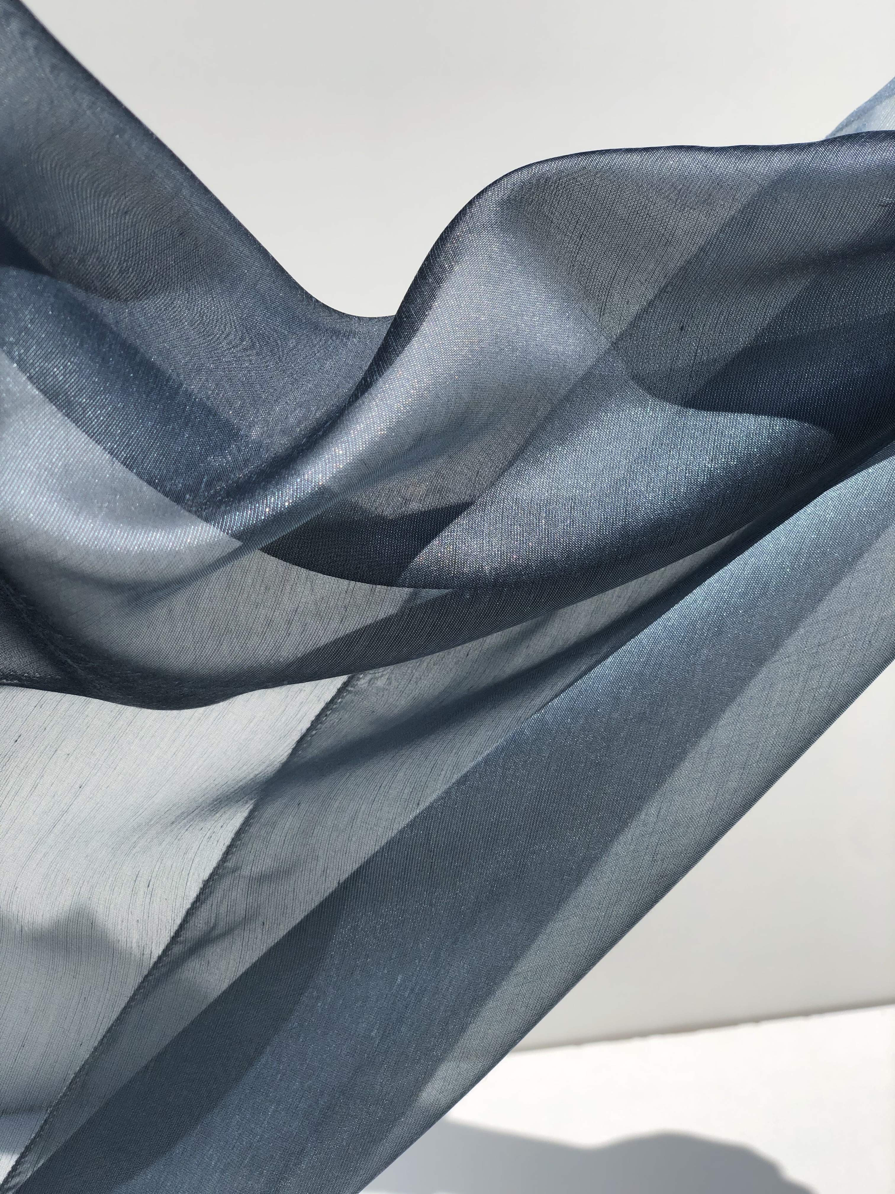 Blue semi-sheer drapery