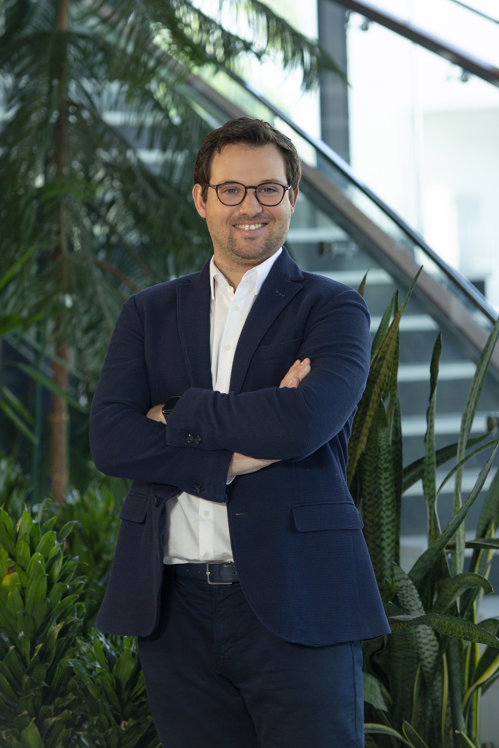 Smiling man with glasses