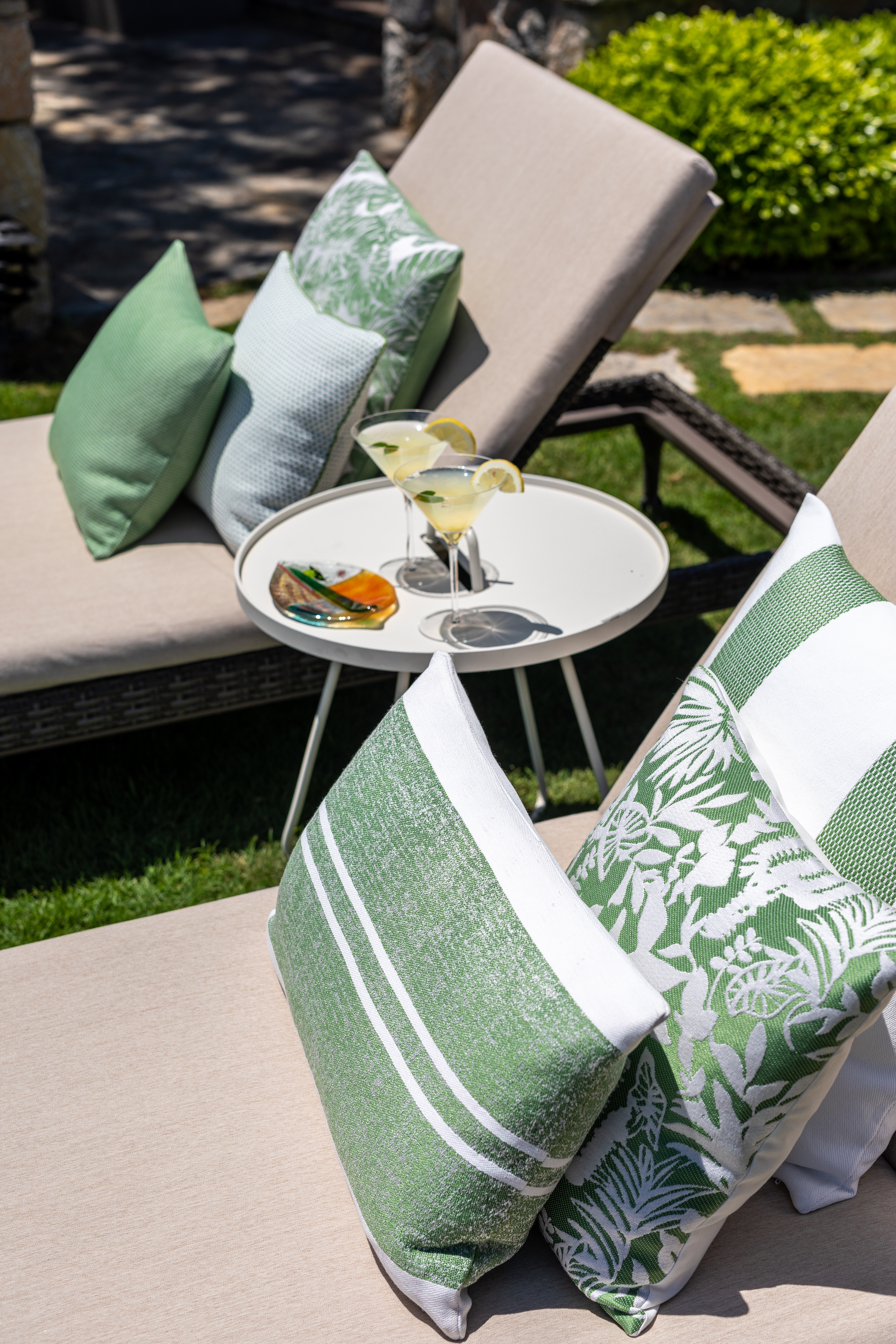 colourful cushions on lounge chair outside