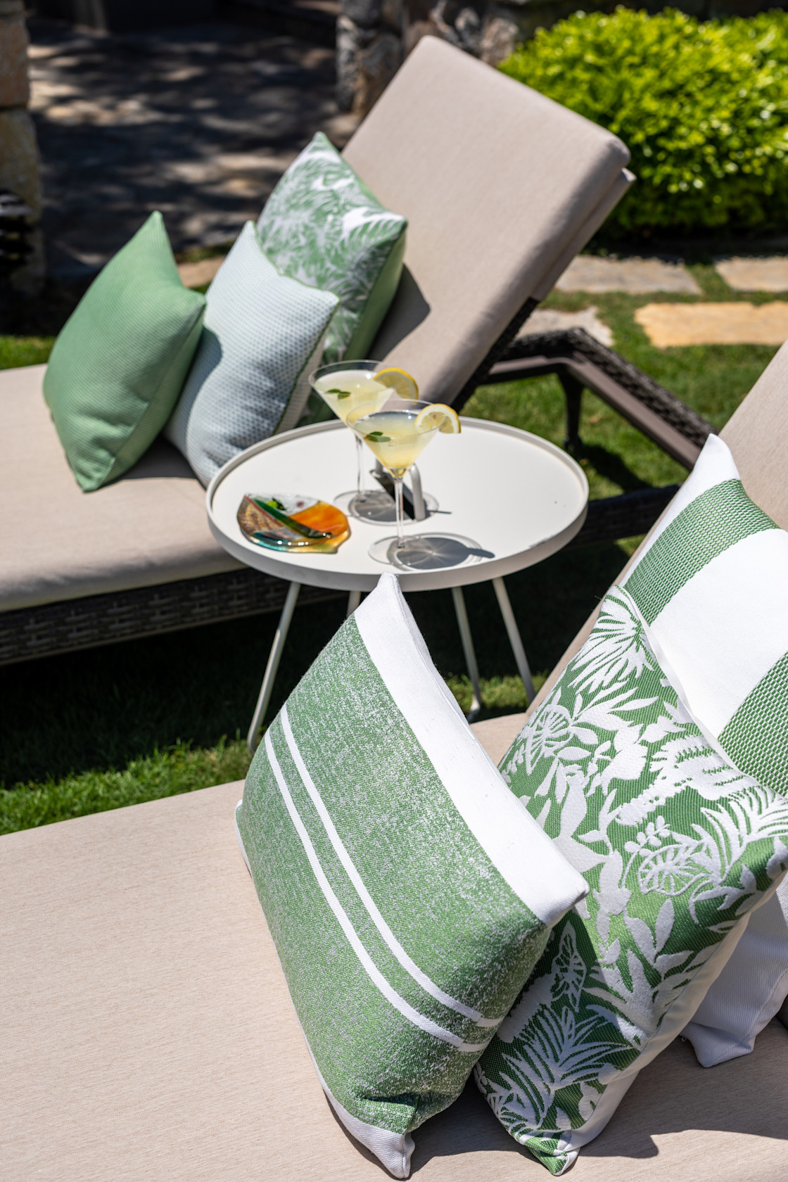 colourful cushions on lounge chair outside