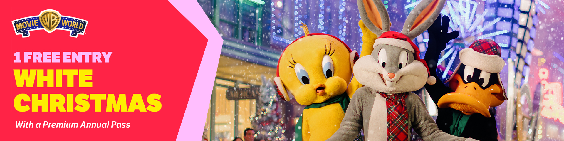 Bugs Bunny, Tweety Bird, and Daffy Duck in festive holiday attire stand smiling in a snowy, decorated street. Text reads: "1 Free Entry White Christmas with a Premium Annual Pass.