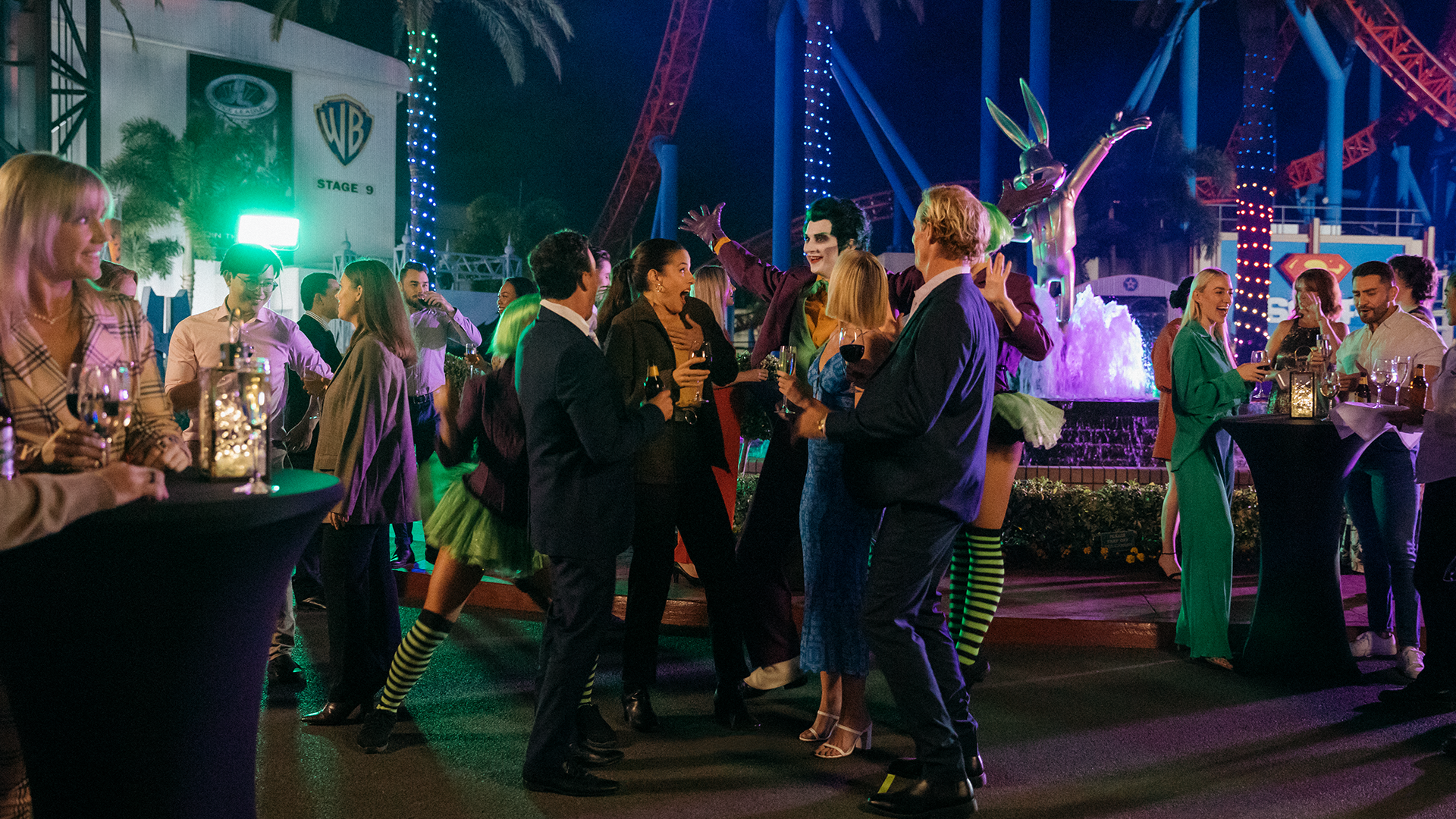Corporate event attendees wearing smart clothing riding the exhilarating Superman Escape thrill ride at Warner Bros. Movie World, enjoying a unique and thrilling experience together