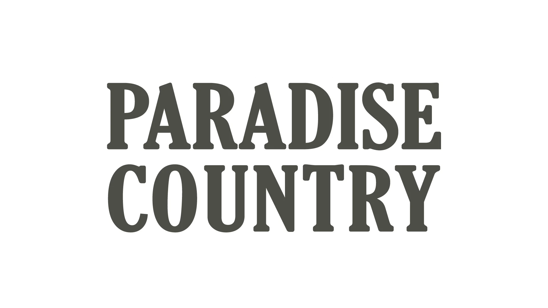 The image displays the text "PARADISE COUNTRY" in bold, gray capital letters with a white outline.