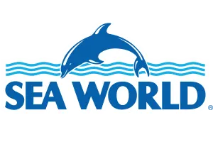 SeaWorld logo featuring a stylized blue dolphin above wavy lines, with the words "Sea World" in bold blue letters below.