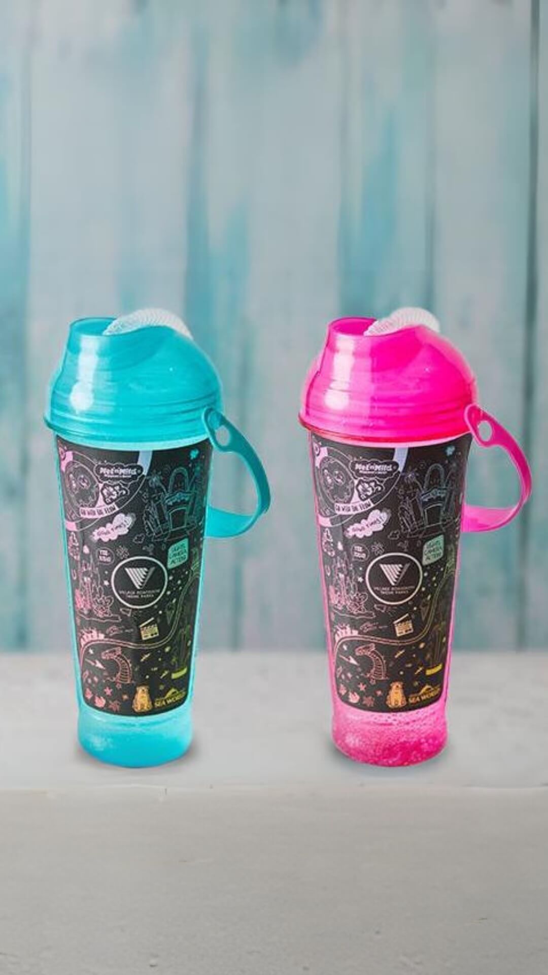 Two colourful souvenir sippers, available at Warner Bros. Movie World