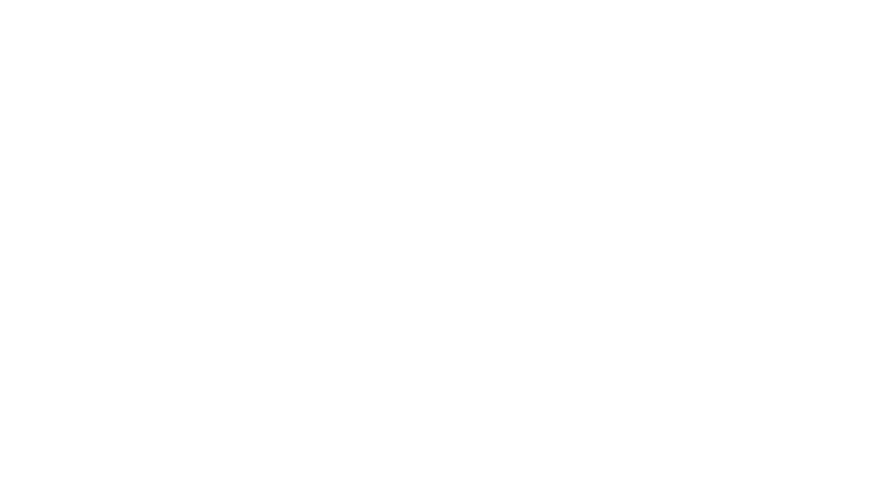 White logo reading “WB Movie World: Hooray for Hollywood” in bold, decorative lettering. The “WB” emblem appears at the top, with all text set against a transparent background.
