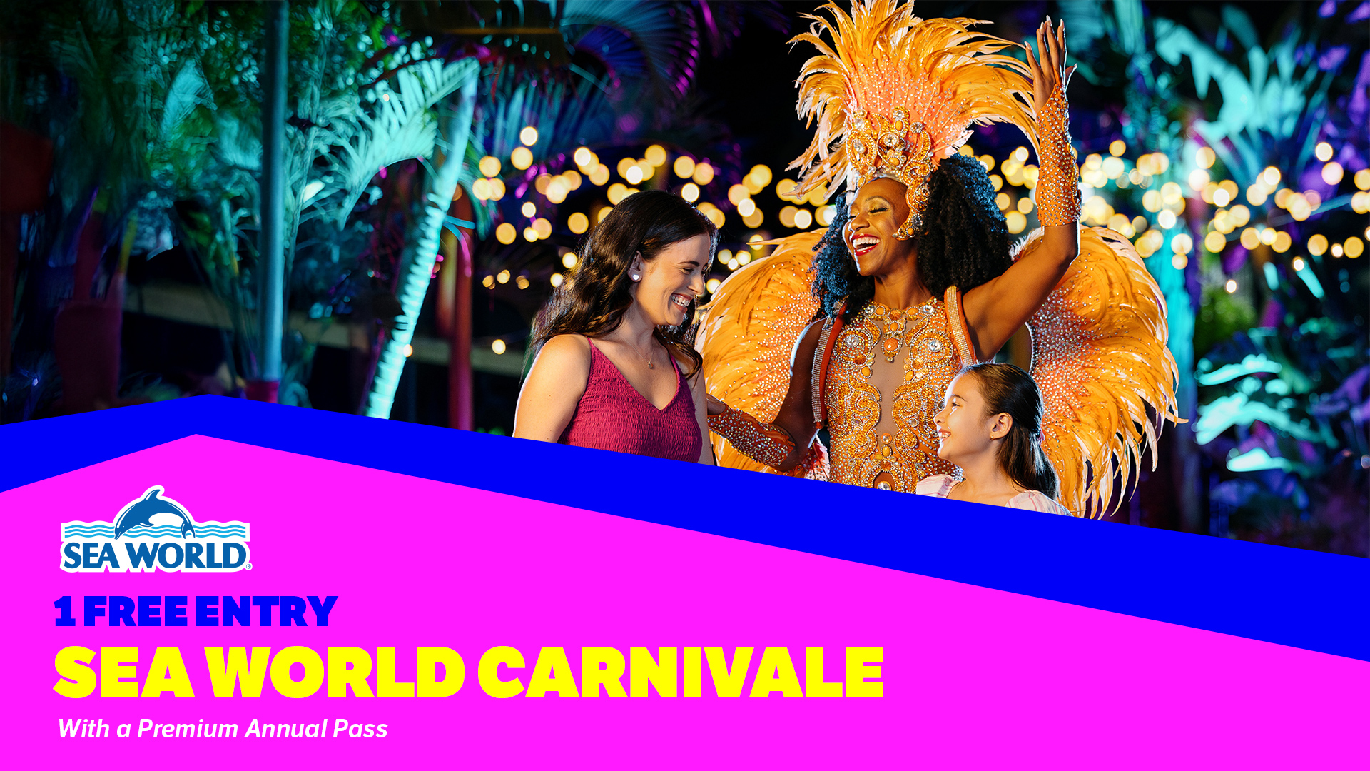 Two women and a young girl smile and interact with a carnival performer in a colorful feathered costume at night, with bright lights and palm trees in the background. Text promotes "Sea World Carnivale" and free entry with a premium pass.