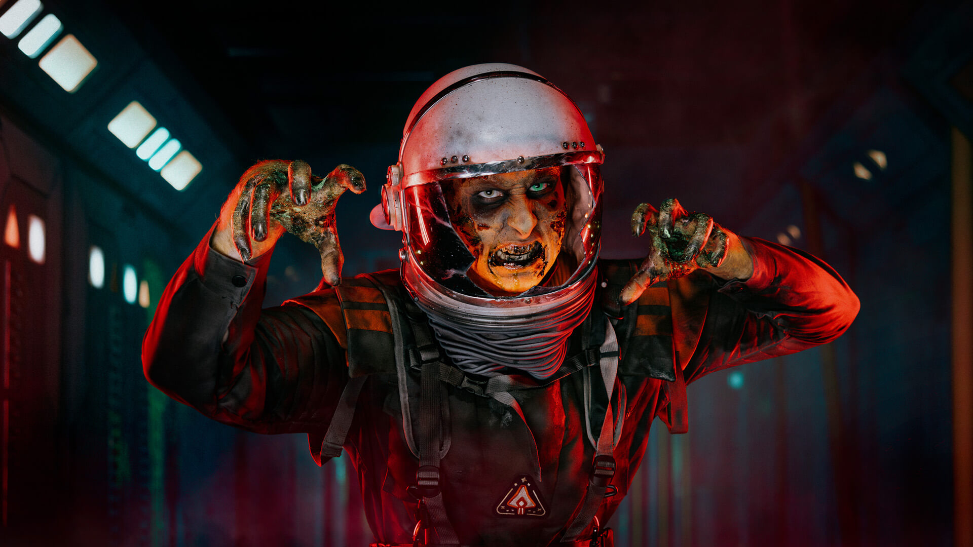 A person in a spacesuit with a cracked helmet appears zombified, showing decayed skin and clawed hands, standing in a dimly lit, sci-fi corridor with a menacing expression.