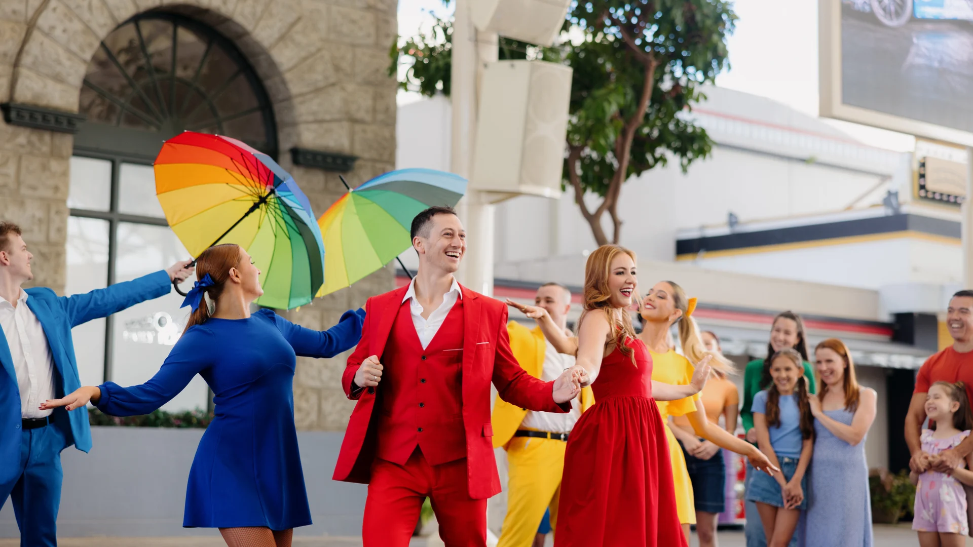 Three dancers performing on Main Street at Warner Bros. Movie World