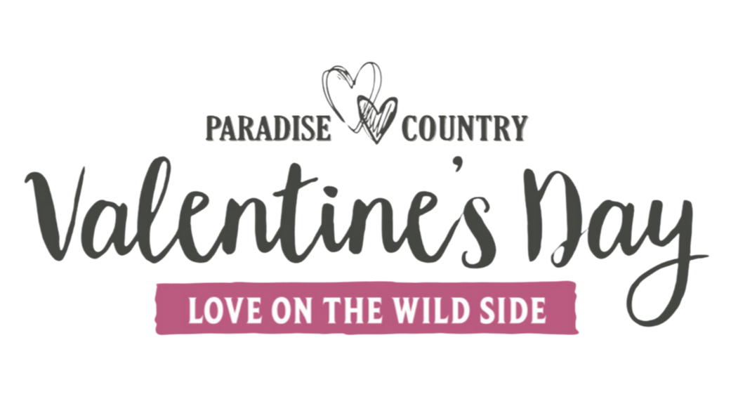 Paradise Country Valentine’s Day logo with two hearts and the slogan "Love on the Wild Side" on a pink banner.
