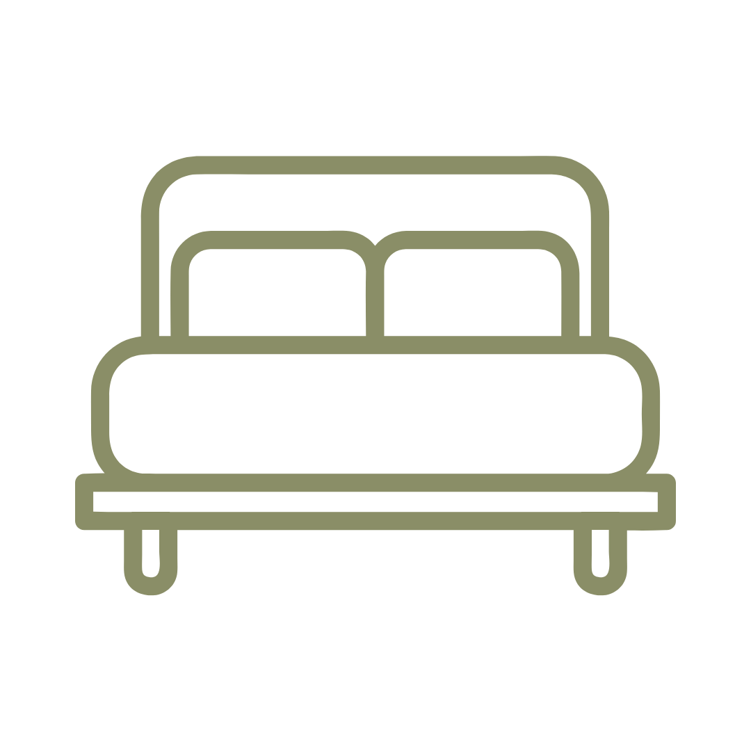 Green outline icon of a double bed.