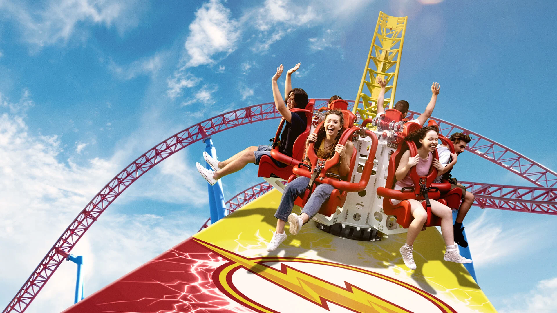 Riders experiencing The Flash: Speed Force attraction at Warner Bros. Movie World, immersed in high-speed thrills and superhero-themed excitement