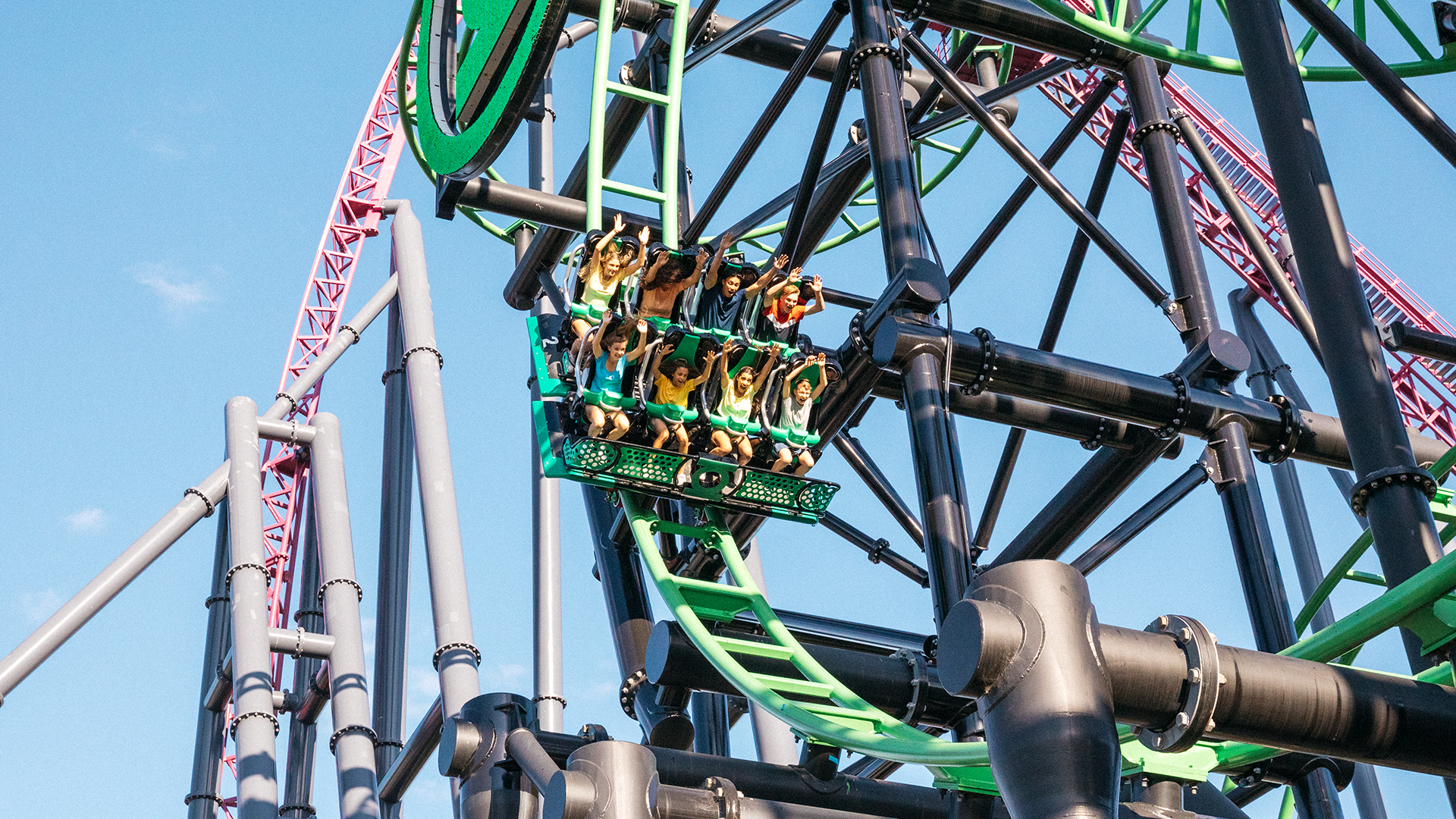 Experience the electrifying twists and turns of the Green Lantern attraction at Warner Bros Movie World. This photo captures the excitement of riders soaring through thrilling loops and curves on this iconic coaster.